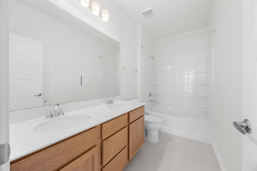 Furnished interior view inside a new home in Creekside at Estancia, Austin (Image 9).