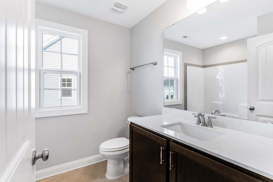 Representative furnished interior of a home built from the Clayton by Caviness & Cates Communities in Bartlett Manor, Youngsville (Image 211).