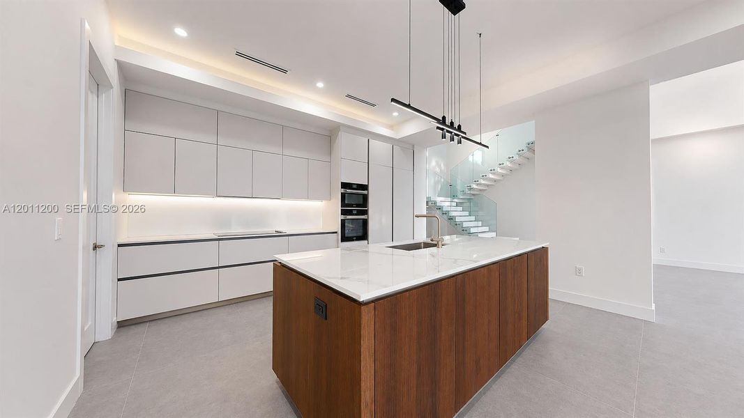 Furnished interior view inside a new home in , Miami Lakes (Image 18).