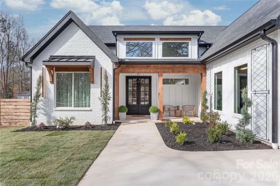Front exterior of a new home in , Waxhaw, NC, highlighting curb appeal (Image 23). Front exterior of a new home in , Waxhaw, NC, highlighting curb appeal (Image 23).