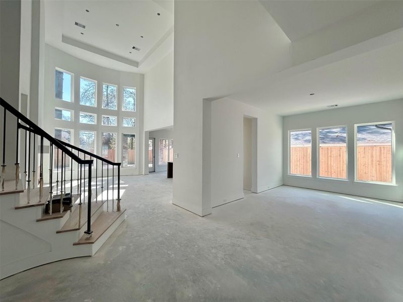 Open Concept Living Area with Formal Dining Room Ideal for Entertaining. Construction Photo as of 2/17/2026