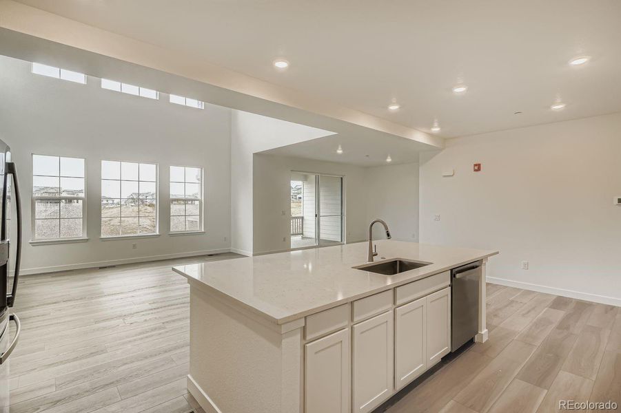 Furnished interior view inside a new home in Sunset Village: The Grand Collection, Erie (Image 4). Furnished interior view inside a new home in Sunset Village: The Grand Collection, Erie (Image 4).