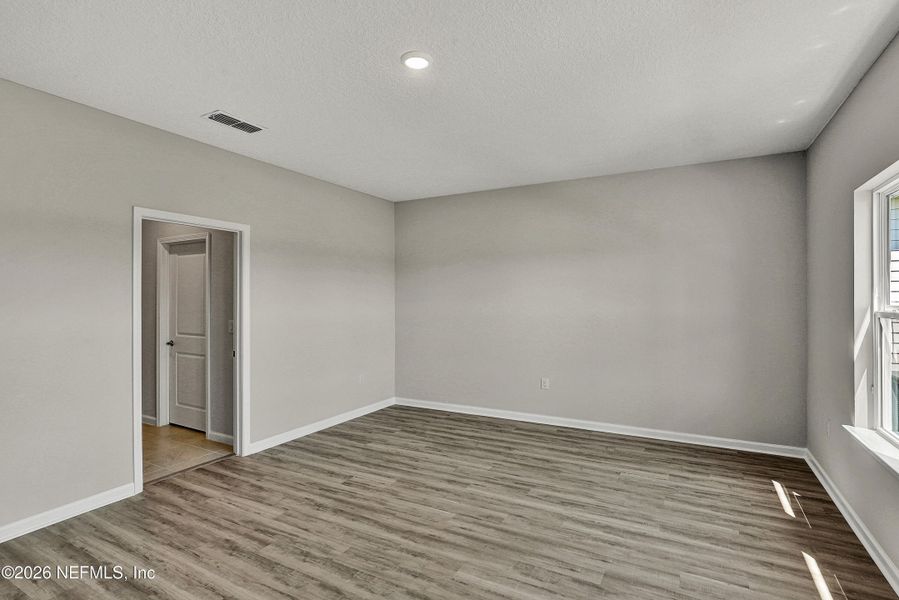 Spacious, unfurnished interior of a new home in New 55+ Active Adult Community in St. Augustine, St. Augustine (Image 11).