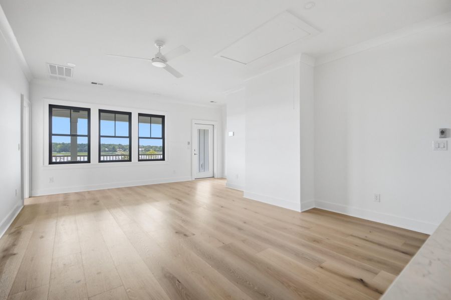 Spacious, unfurnished interior of a new home in , Awendaw (Image 24).