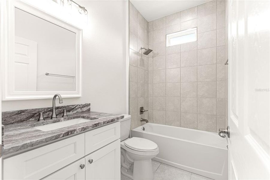 Furnished interior view inside a new home in , Dunnellon (Image 12).