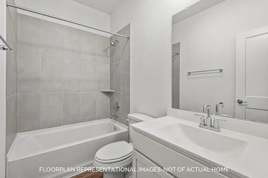 Furnished interior view inside a new home in Sorella, Tomball (Image 7).