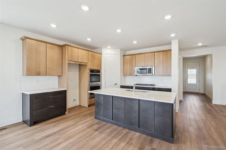 Furnished interior view inside a new home in Windsong, Thornton (Image 6).