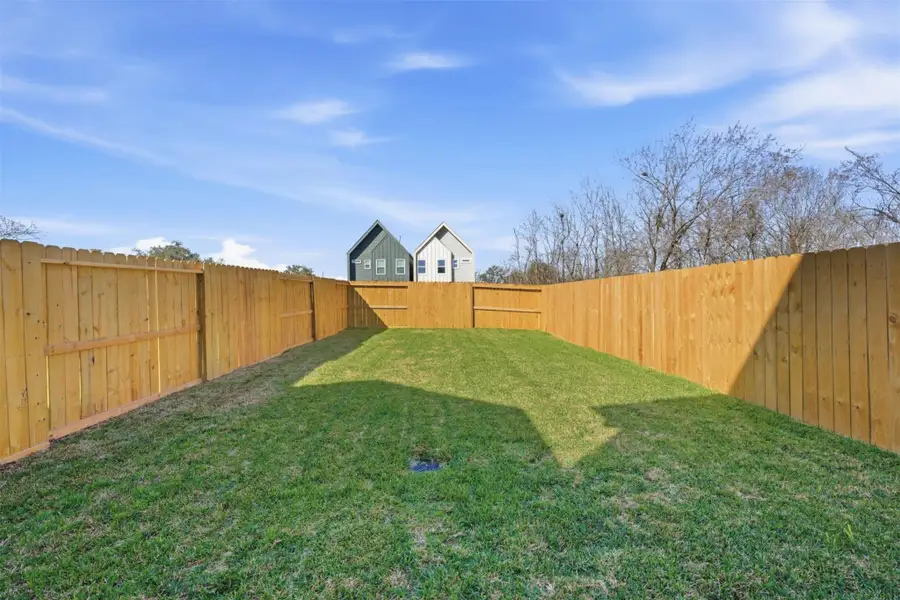 This large backyard is completely fenced in. There’s room for the dog to run around, with plenty of space to lounge, host BBQ, and entertain. This large backyard is completely fenced in. There’s room for the dog to run around, with plenty of space to lounge, host BBQ, and entertain.