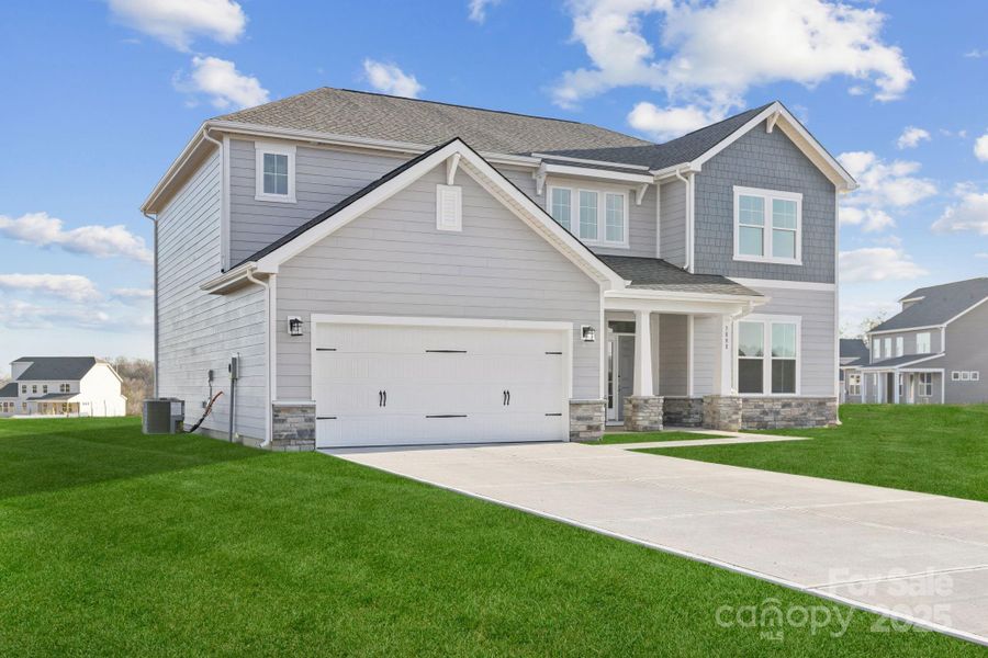 Front exterior of a new home in Stonemill, Monroe, NC, highlighting curb appeal (Image 6).