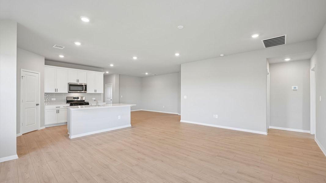 Spacious, unfurnished interior of a new home in Carillon, Manor (Image 15).