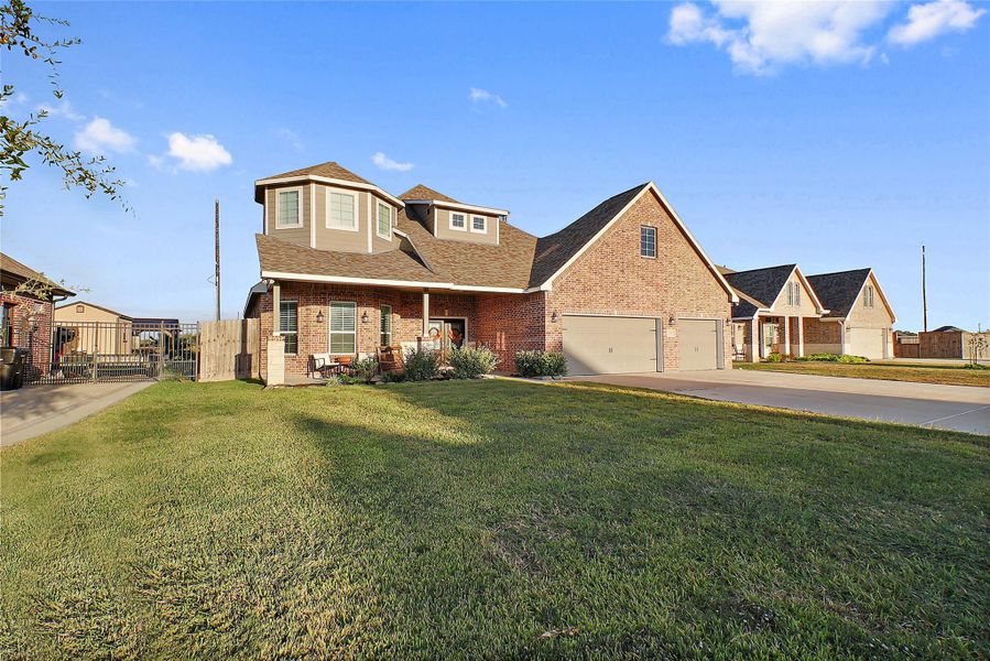 Front exterior of a new home in , Baytown, TX, highlighting curb appeal (Image 2).
