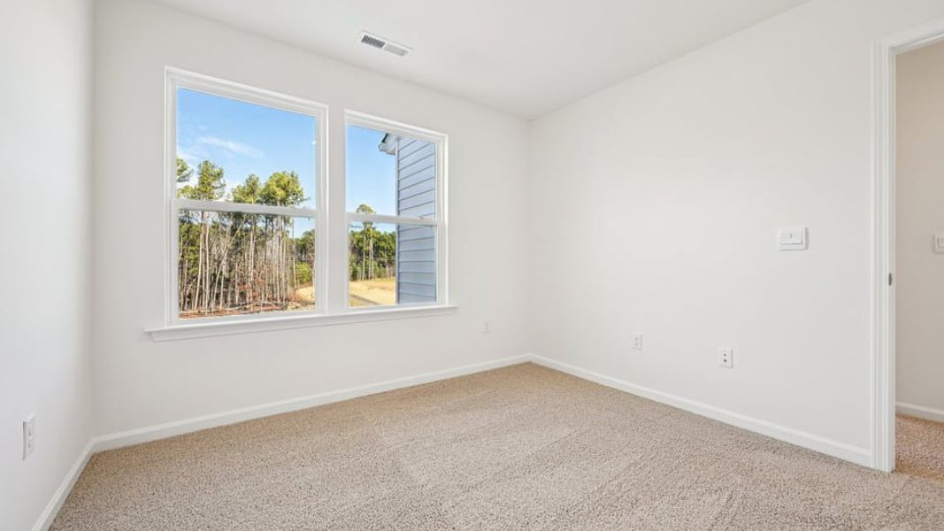 Spacious, unfurnished interior of a new home in Chapel Townes, Raleigh (Image 25).