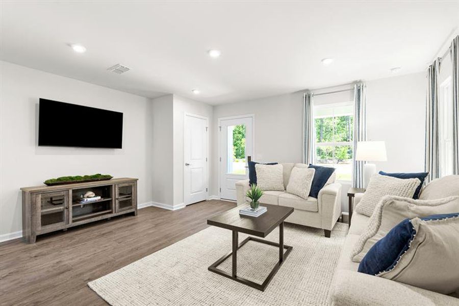 Representative furnished interior of a home built from the Ellis by Ryan Homes in Middle Creek Village Coastal Cottages & Villas, Bolivia (Image 15).