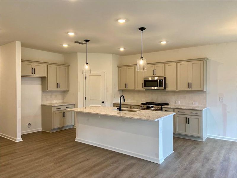 Furnished interior view inside a new home in Eastlyn Crossing, Flowery Branch (Image 11).