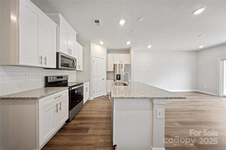 Furnished interior view inside a new home in Braemar Village, Monroe (Image 3). Furnished interior view inside a new home in Braemar Village, Monroe (Image 3).