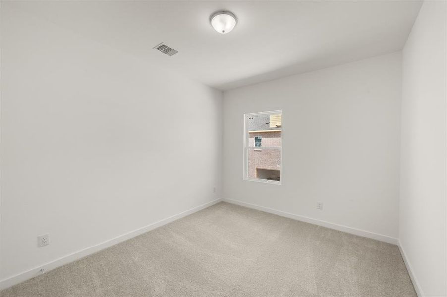 Spacious, unfurnished interior of a new home in The Pointe at Capp Smith Lake, Watauga (Image 29).