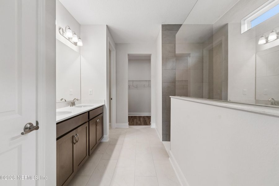 Furnished interior view inside a new home in Tributary 50', Yulee (Image 7).