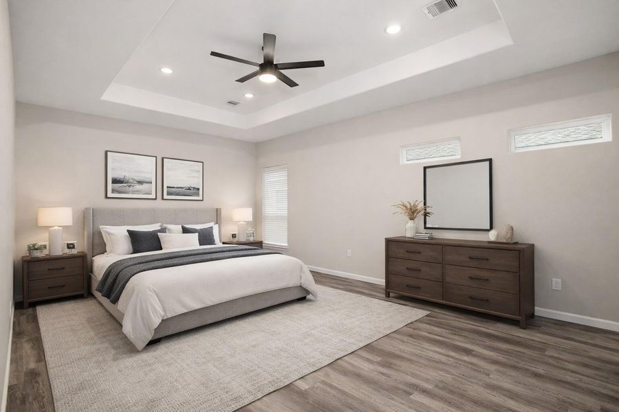 Virtually staged primary bedroom (upstairs)
