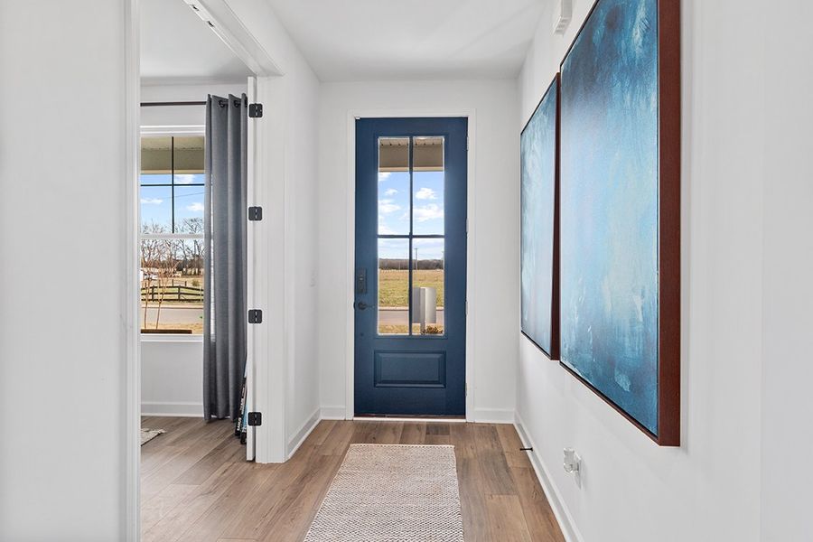 A room with a door and a window.