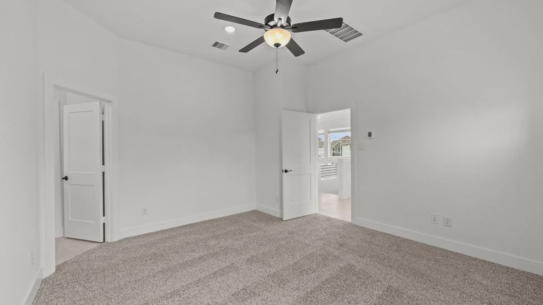 Spacious, unfurnished interior of a new home in Elyson Courtyard Collection, Katy (Image 19).