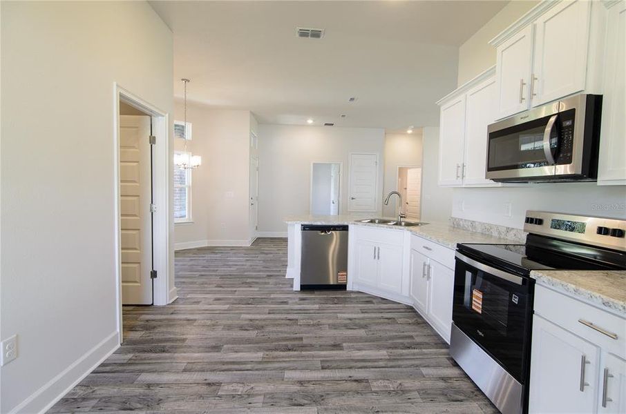 Furnished interior view inside a new home in Palm Coast, Palm Coast (Image 5). Furnished interior view inside a new home in Palm Coast, Palm Coast (Image 5).