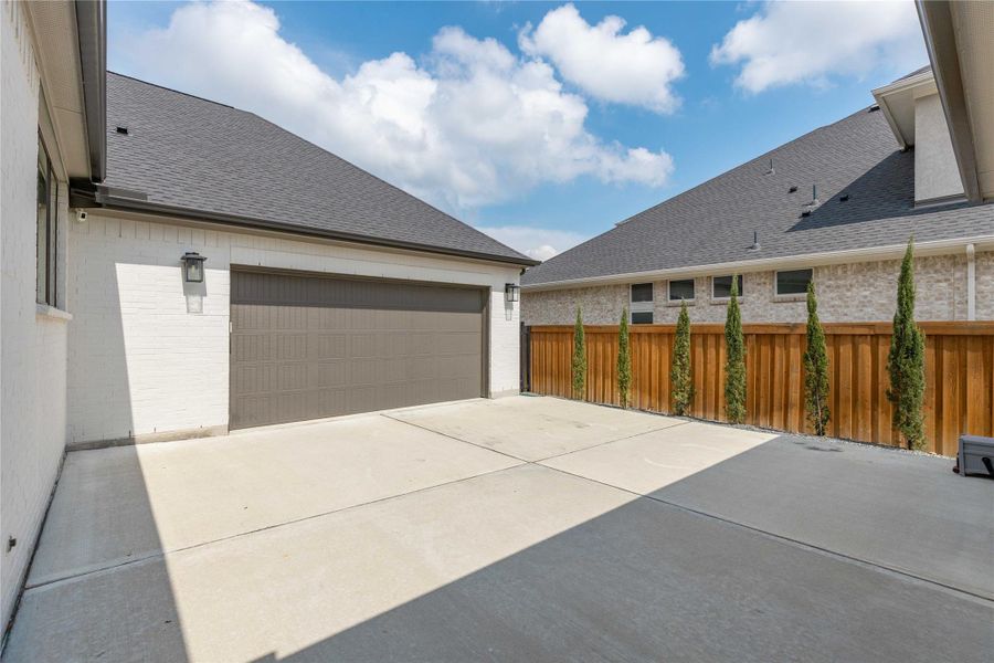 Exterior details and patio area of a home in , Spring (Image 3).