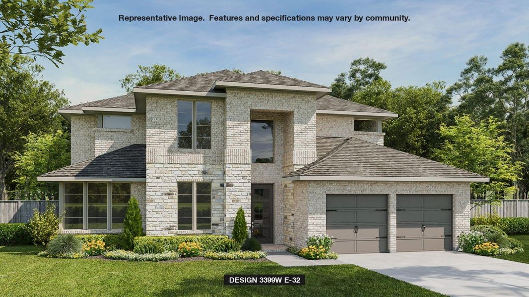 View of front of property featuring a garage and a front yard