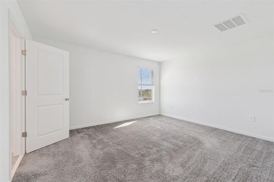 Spacious, unfurnished interior of a new home in Peace Creek Reserve: Legacy Collection, Winter Haven (Image 16). Spacious, unfurnished interior of a new home in Peace Creek Reserve: Legacy Collection, Winter Haven (Image 16).