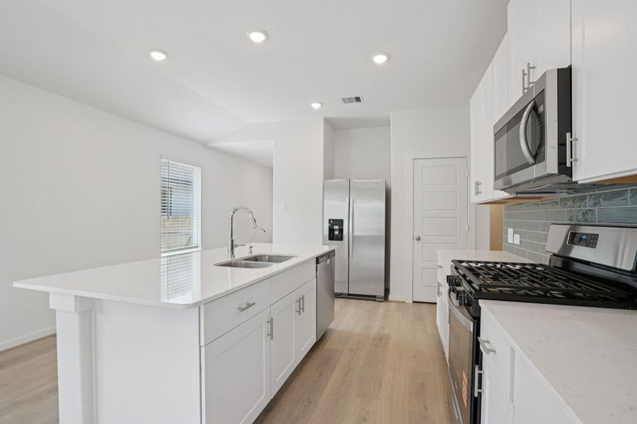 Furnished interior view inside a new home in Pine Lake Cove - Traditional Series, Montgomery (Image 5).