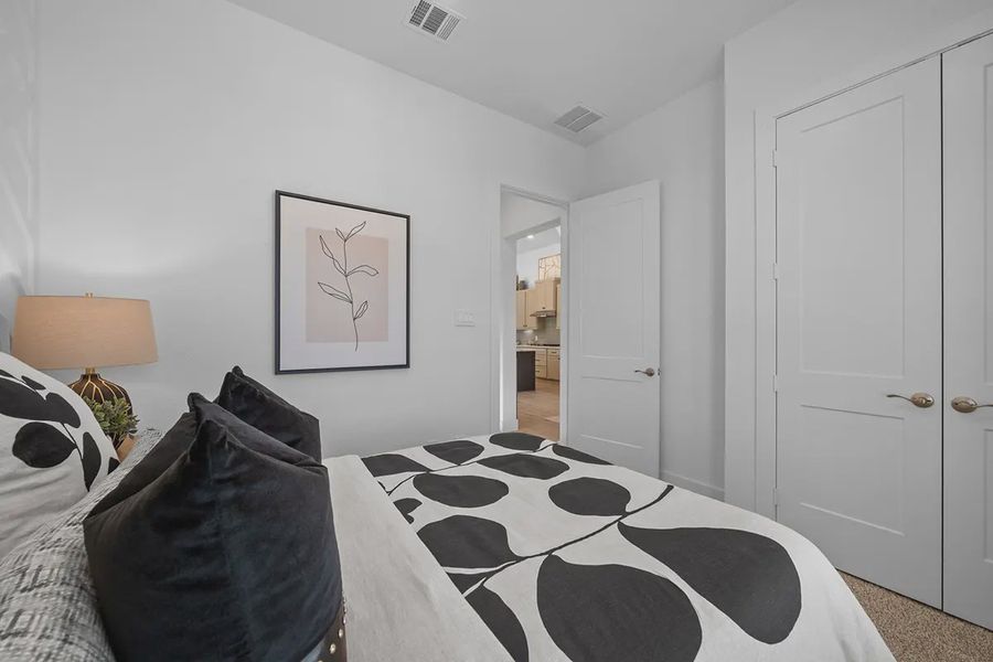 Representative furnished interior of a home built from the Bonneville by Chesmar Homes in Grange, Katy (Image 17).