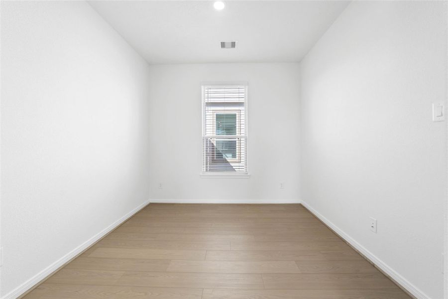 The Den offers a versatile space that seamlessly expands your living options—perfect for a home office, playroom, media space, or whatever suits your lifestyle. The Den features vinyl plank flooring, custom neutral tone paint, high ceilings, recessed lighting and a large window with privacy blinds.