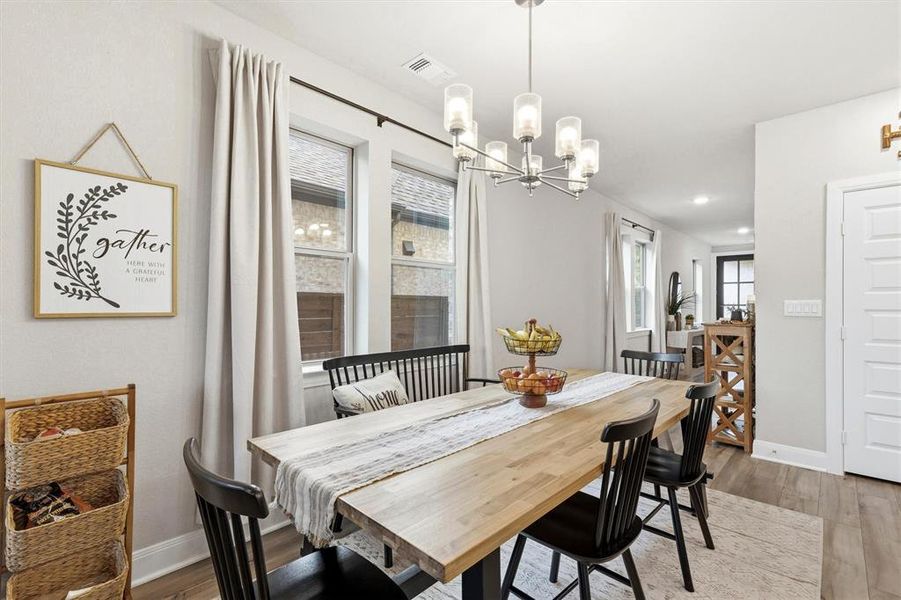This dining area is adjacent to the kitchen with space for a large table This dining area is adjacent to the kitchen with space for a large table