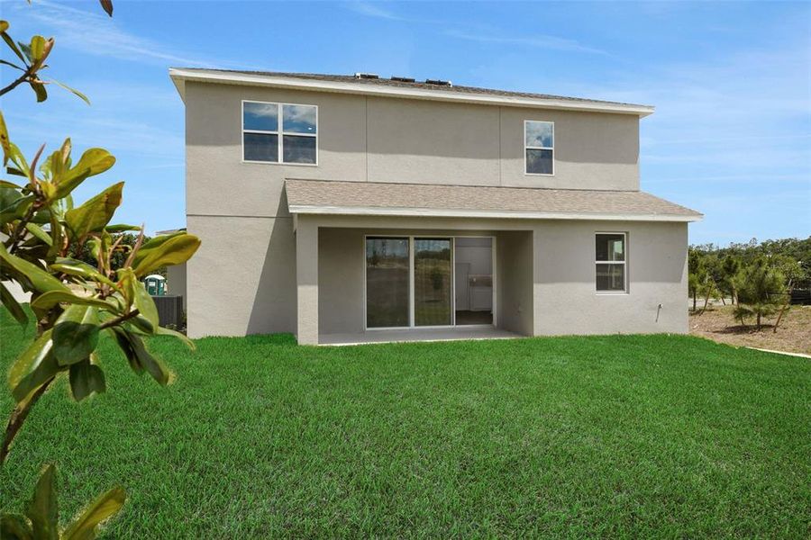 Exterior details and patio area of a home in Tuscan Hills, Dade City (Image 3).