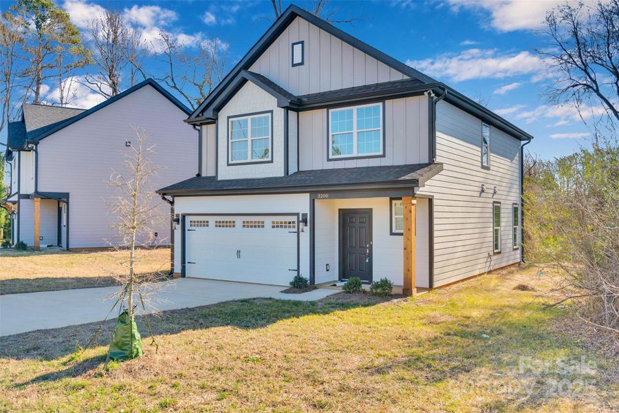Front exterior of a new home in , Charlotte, NC, highlighting curb appeal (Image 24).