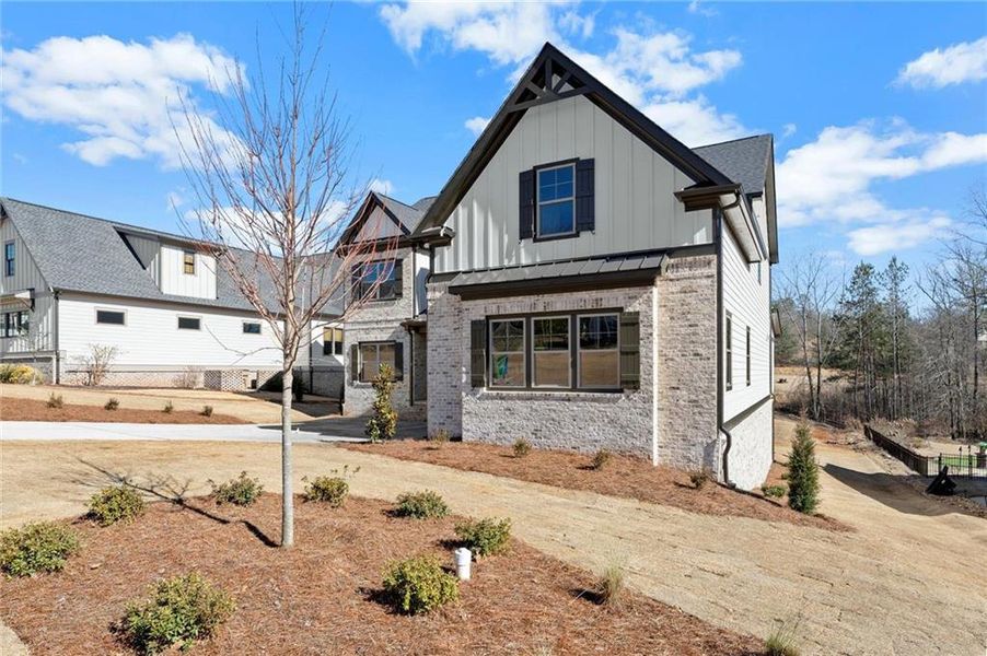 Front exterior of a new home in , Jefferson, GA, highlighting curb appeal (Image 26).