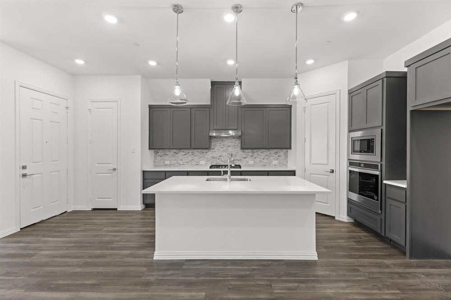 Brown Townhome Kitchen by Ashton Woods