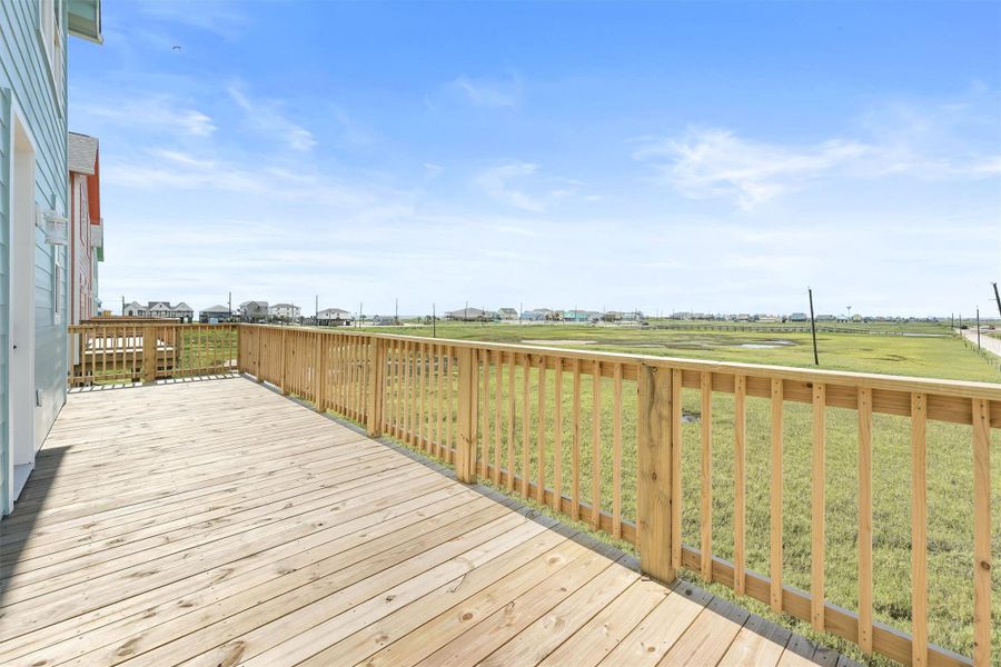Partially shaded, spacious deck with long-range views of the wetlands, ICW, beach, and bay. Partially shaded, spacious deck with long-range views of the wetlands, ICW, beach, and bay.