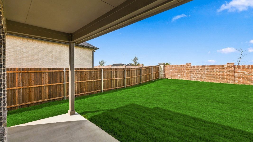 Exterior details and patio area of a home in Wildflower Ranch, Fort Worth (Image 23).