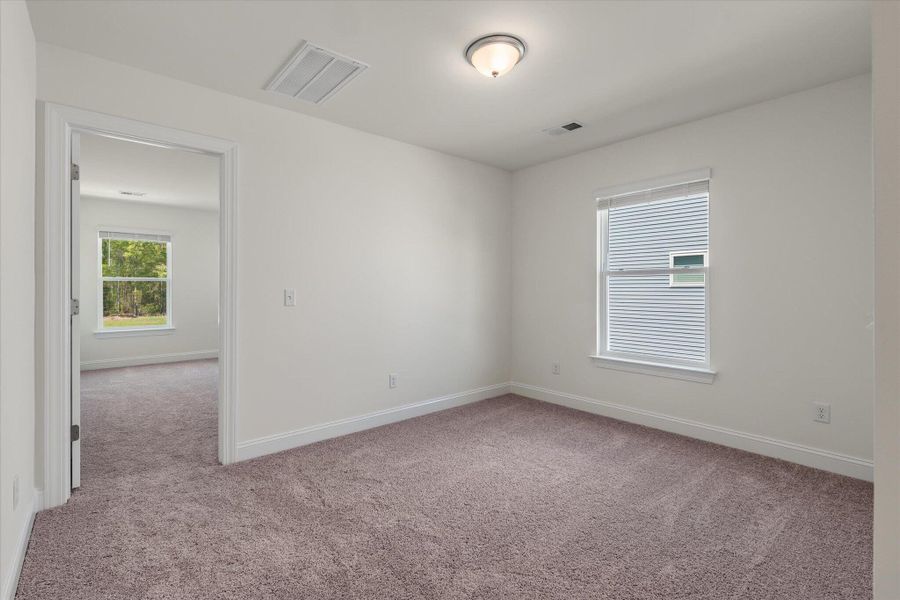 Spacious, unfurnished interior of a new home in The Landings at Montague, Goose Creek (Image 23).