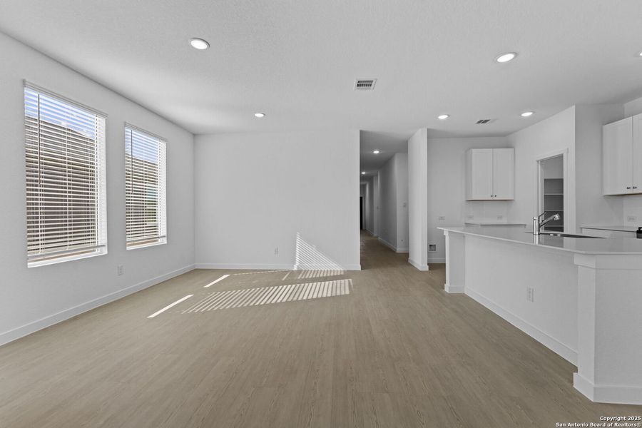 Spacious, unfurnished interior of a new home in Waterwheel: Coastline Collection, San Antonio (Image 26).