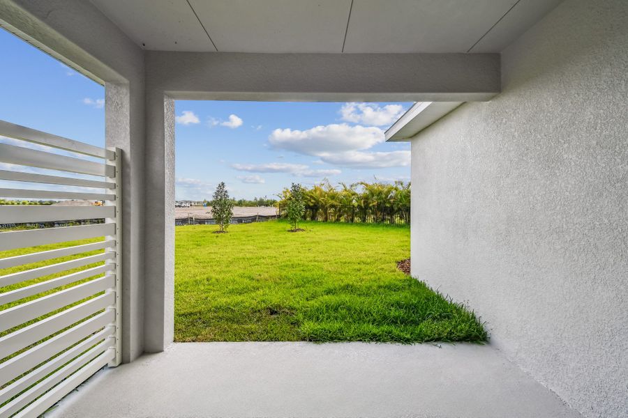 Exterior details and patio area of a home in North River Ranch – Garden Series, Parrish (Image 3).