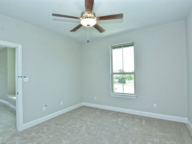 Representative unfurnished interior of a home built from the Madera II by Giddens Homes in Scofield Farms Estates, Georgetown (Image 328).