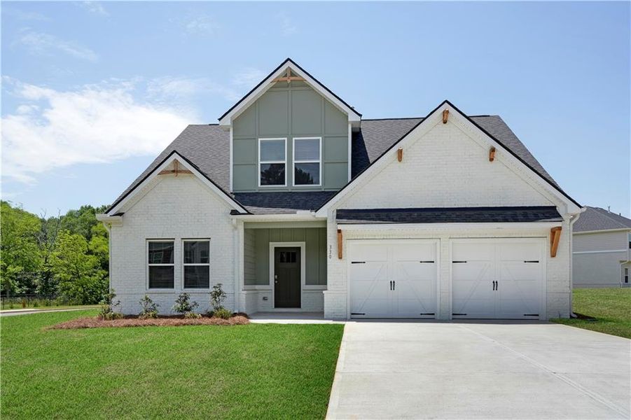 Front exterior of a new home in Conner Springs, Social Circle, GA, highlighting curb appeal (Image 21). Front exterior of a new home in Conner Springs, Social Circle, GA, highlighting curb appeal (Image 21).