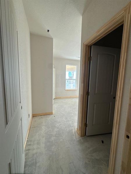 Hall with a textured ceiling Hall with a textured ceiling