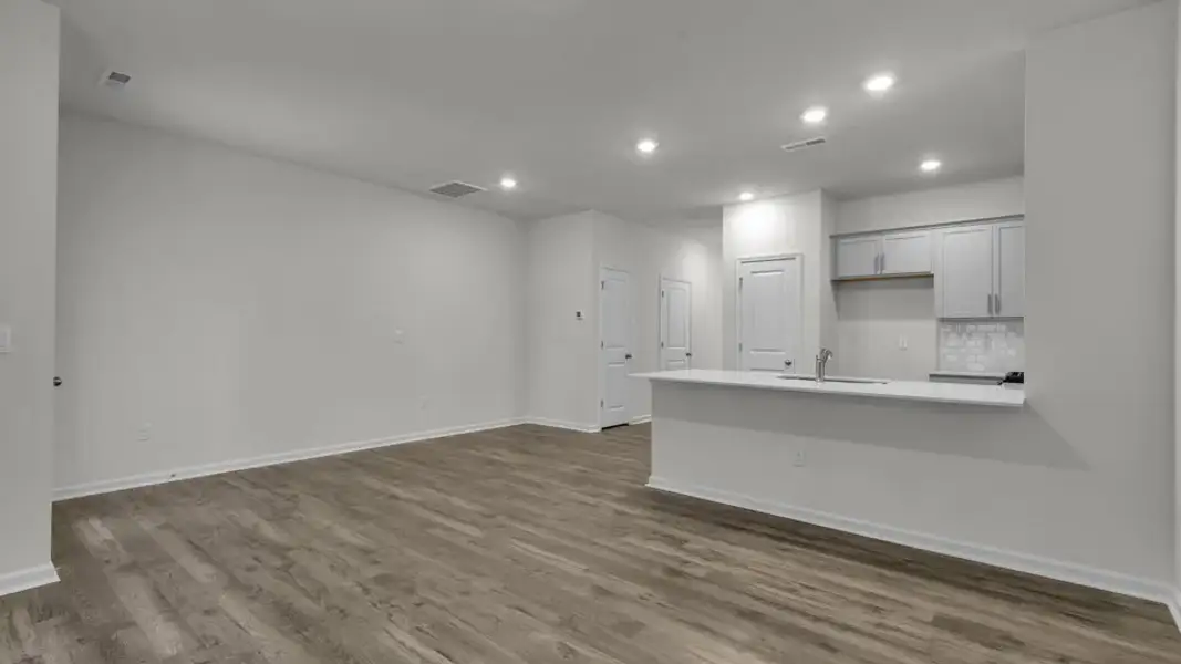 Spacious, unfurnished interior of a new home in The Townes at Prestleigh, Wake Forest (Image 15).