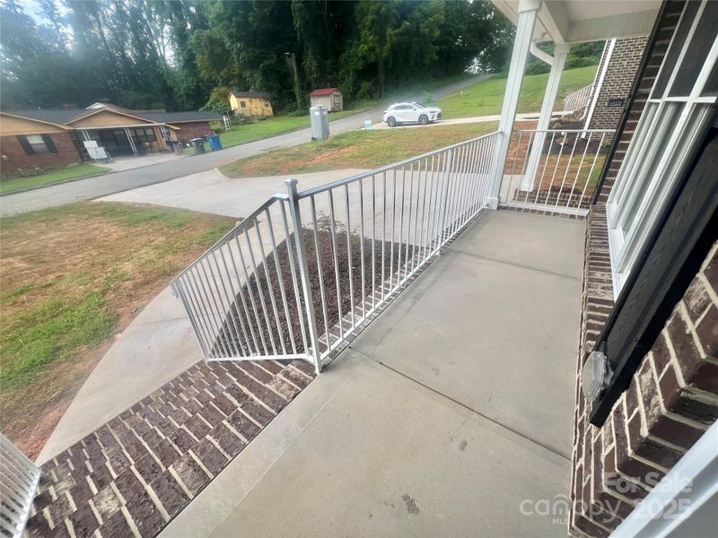 Nice Concrete front porch, Metal handrailing
