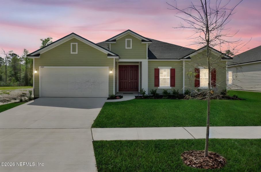 Front exterior of a new home in Jennings Farm, Middleburg, FL, highlighting curb appeal (Image 22).