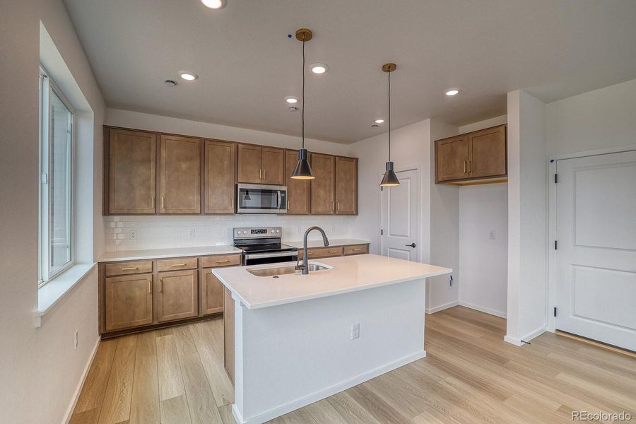 Furnished interior view inside a new home in Harvest Crossing, Aurora (Image 8). Furnished interior view inside a new home in Harvest Crossing, Aurora (Image 8).