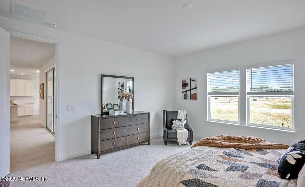 Furnished interior view inside a new home in Edenbrooke at Hyland Trail | 55+: Edenbrooke at Hyland Trail 60s, Green Cove Springs (Image 8).