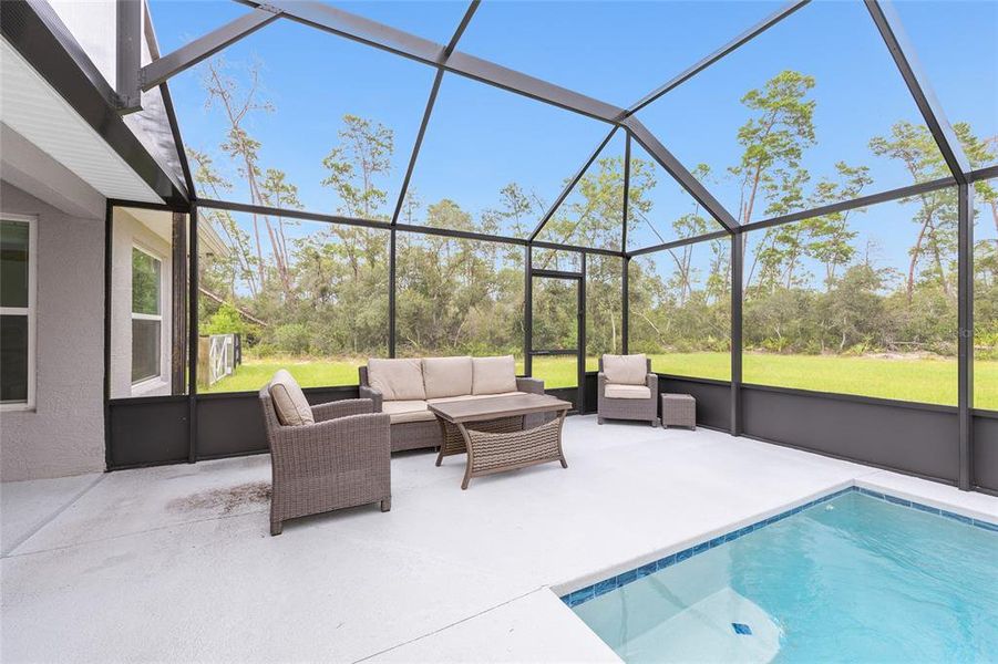 Furnished interior view inside a new home in , Dunnellon (Image 8).